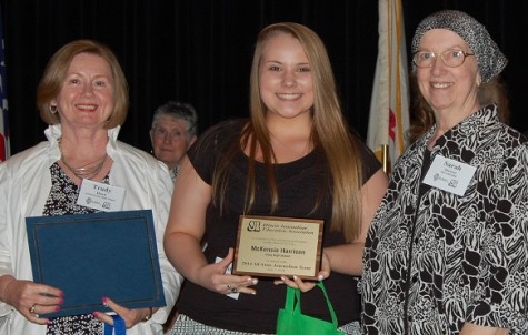 Trudy Hurd, far left, is recognized with one of her Cisne High School students who was made a member of the All-State Journalism Team, along with Sarah Doerner, IJEA president. Hurd became a Certified Journalism Educator in 2007.