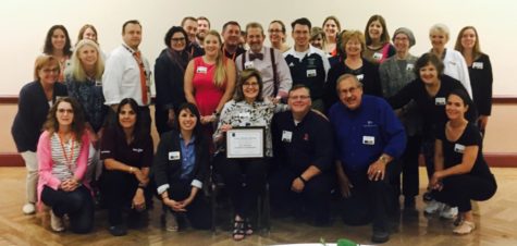 Advisers gather together after a luncheon at the 2017 IJEA Fall Conference.