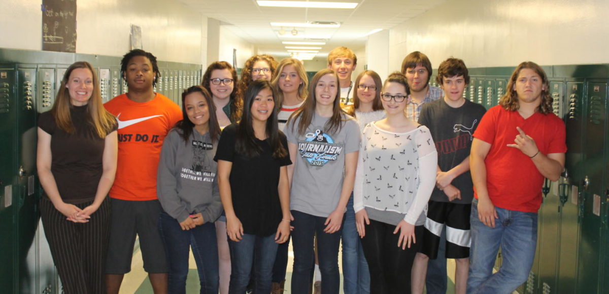 The 2015 staff of the MHS Mirror newspaper stands in the halls of Mattoon High School for our annual photo. Several would go on to major in journalism, at least for a while, and one would end up in my first college news writing classroom.