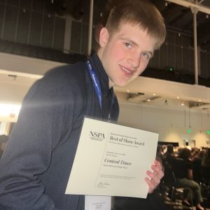 Naperville Central editor-in-chief Jake Pfeiffer displays the Best of Show 6th-place certificate that he and the Central Times staff won last fall at the NSPA/JEA national convention in Boston.