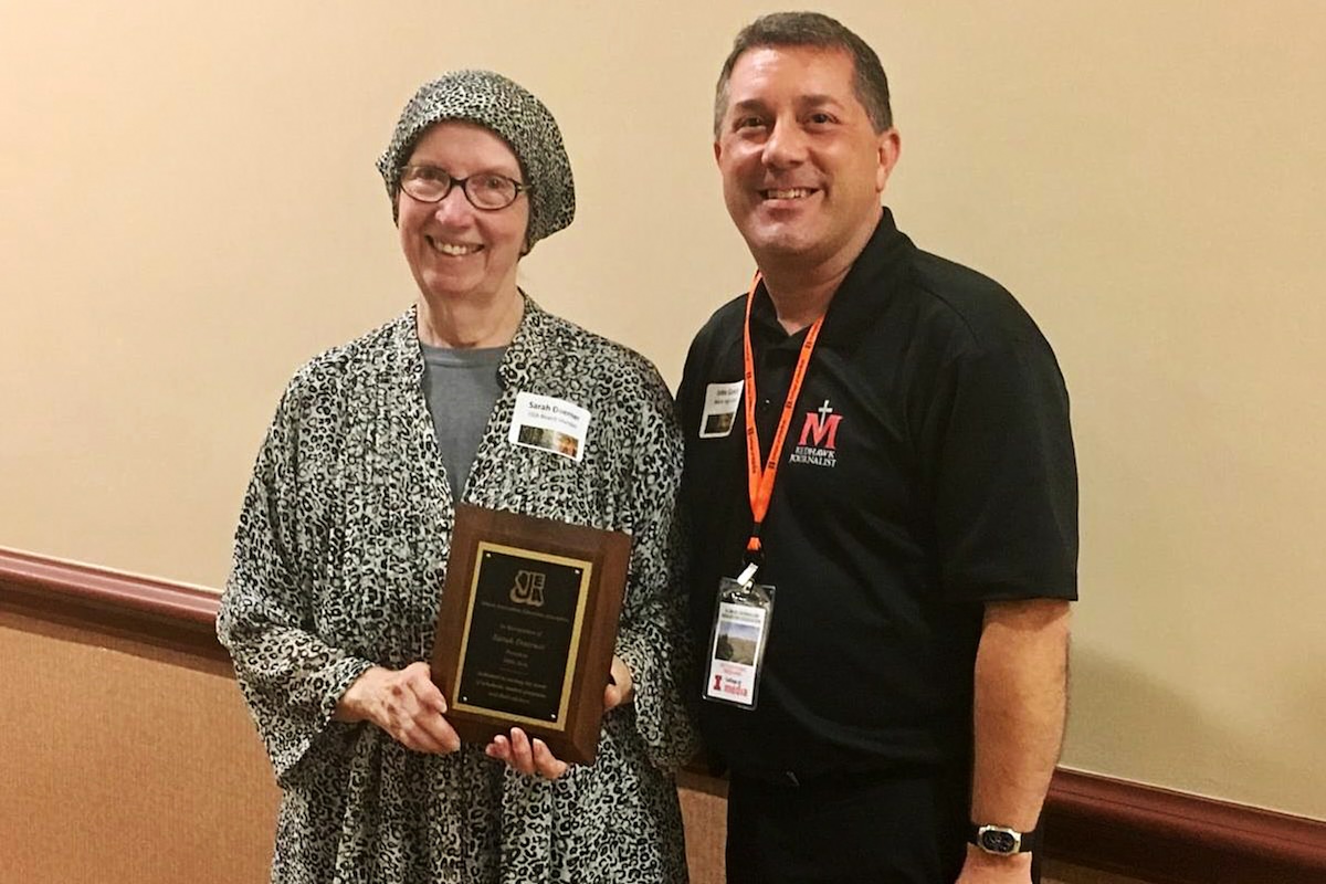 Sarah Doerner, who died Nov. 29 at the age of 86, served as IJEA present for 10 years. A year after she stepped down as president, she received the IJEA Lifetime Achievement Award at the organization's 2017 Fall Conference. Then-IJEA Vice President John Gonczy presented the award. (Photo by Amanda Bright)